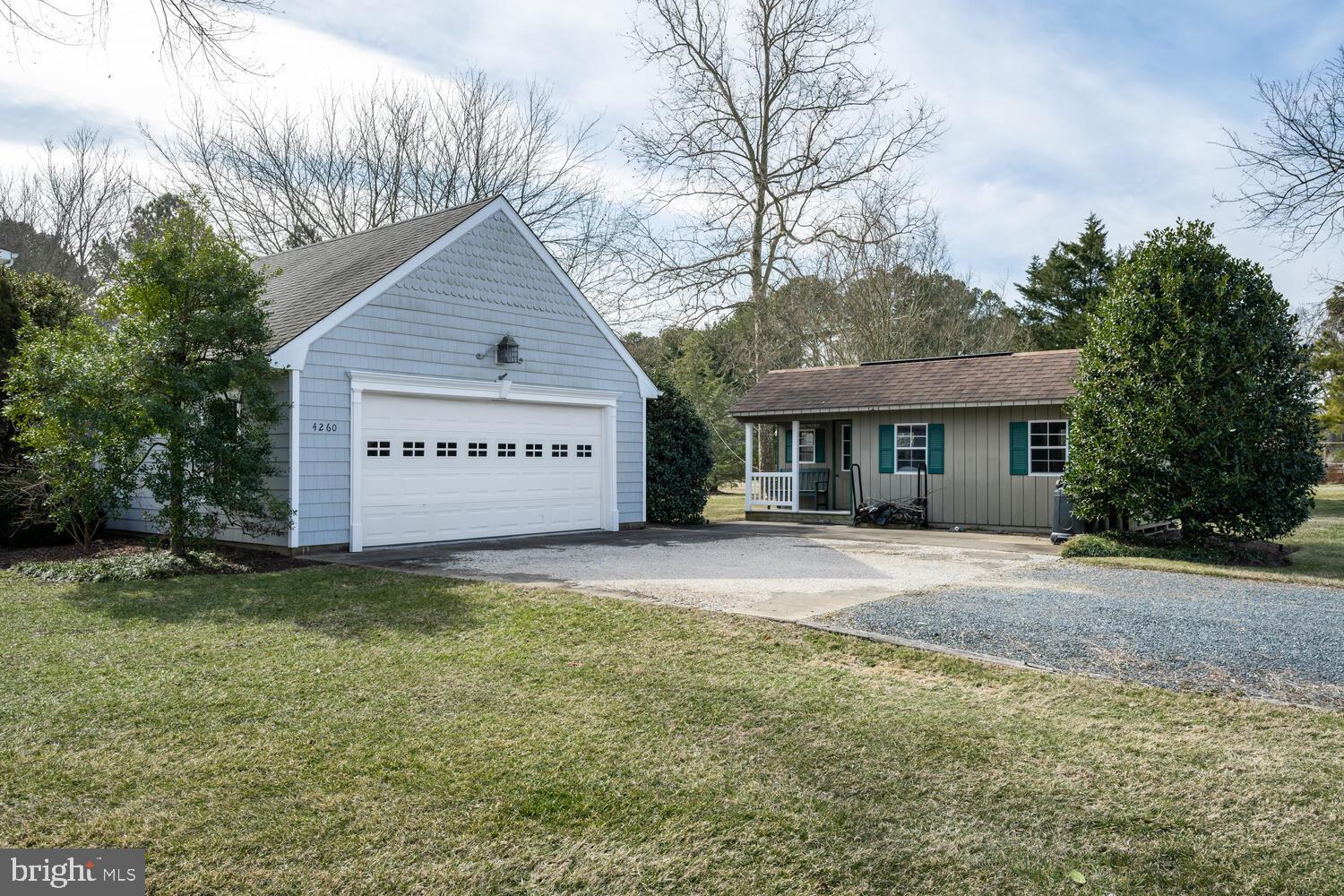 4260 Windrush Road Oxford, MD 21654 - Photo 19 of 39 a view of a house with a yard and large tree