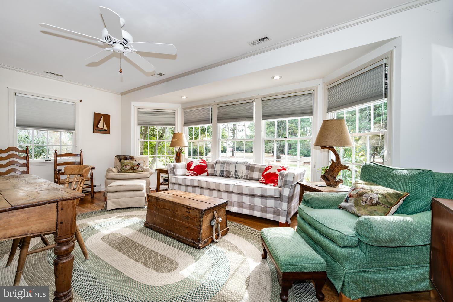 4260 Windrush Road Oxford, MD 21654 - Photo 24 of 39 a living room with furniture and a large window