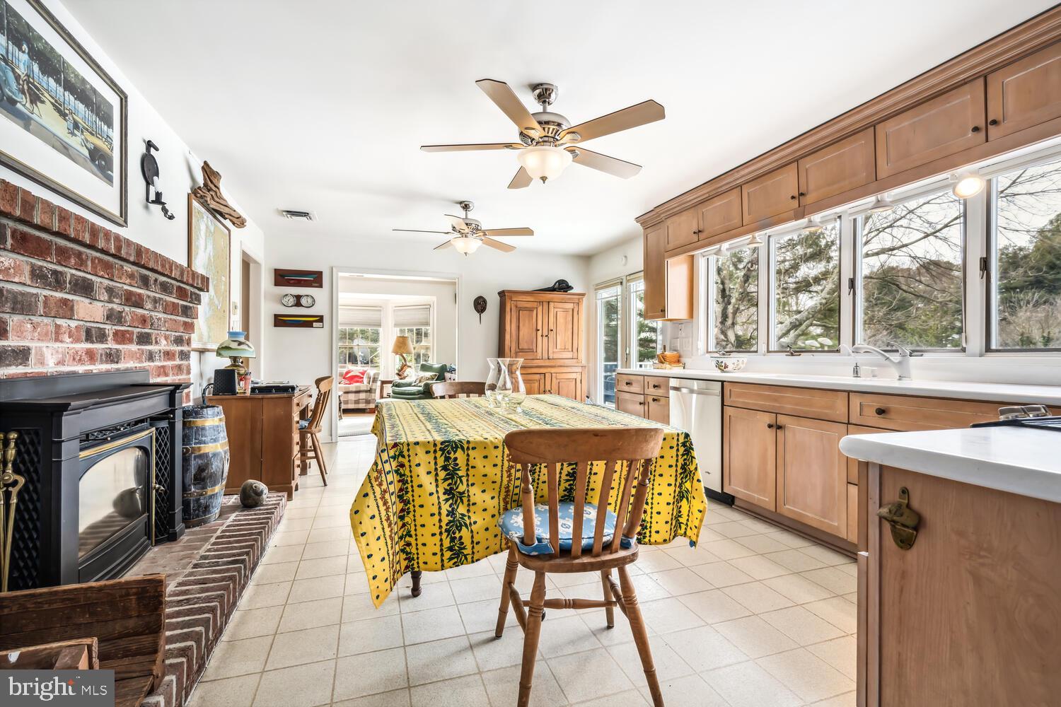 4260 Windrush Road Oxford, MD 21654 - Photo 27 of 39 a large kitchen with a table and chairs