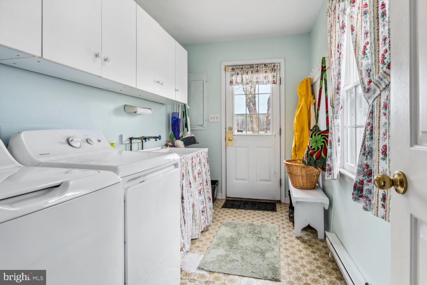 4260 Windrush Road Oxford, MD 21654 - Photo 29 of 39 a utility room with dryer and washer