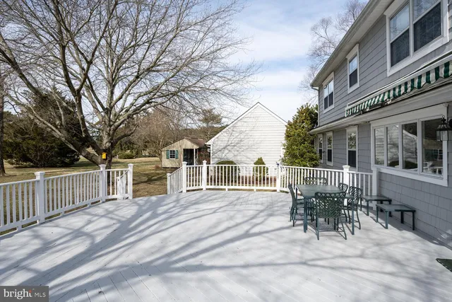 a house view with a sitting space and garden space