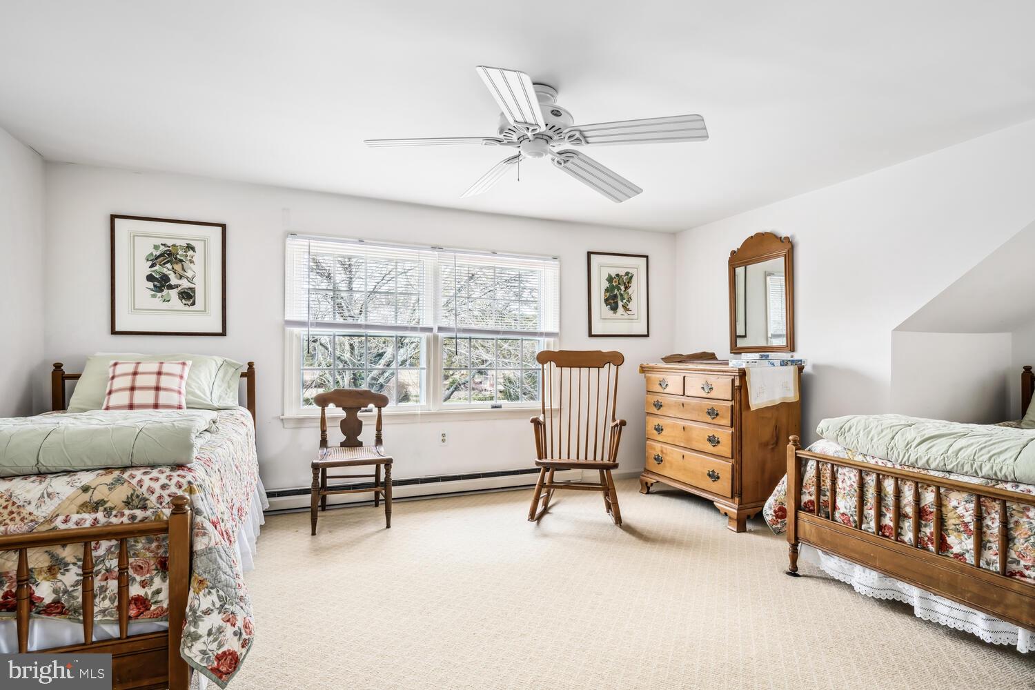4260 Windrush Road Oxford, MD 21654 - Photo 32 of 39 a bedroom with furniture and a window