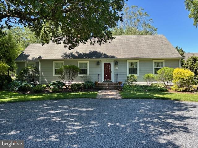 4260 Windrush Road Oxford, MD 21654 - Photo 9 of 39 a front view of a house with garden