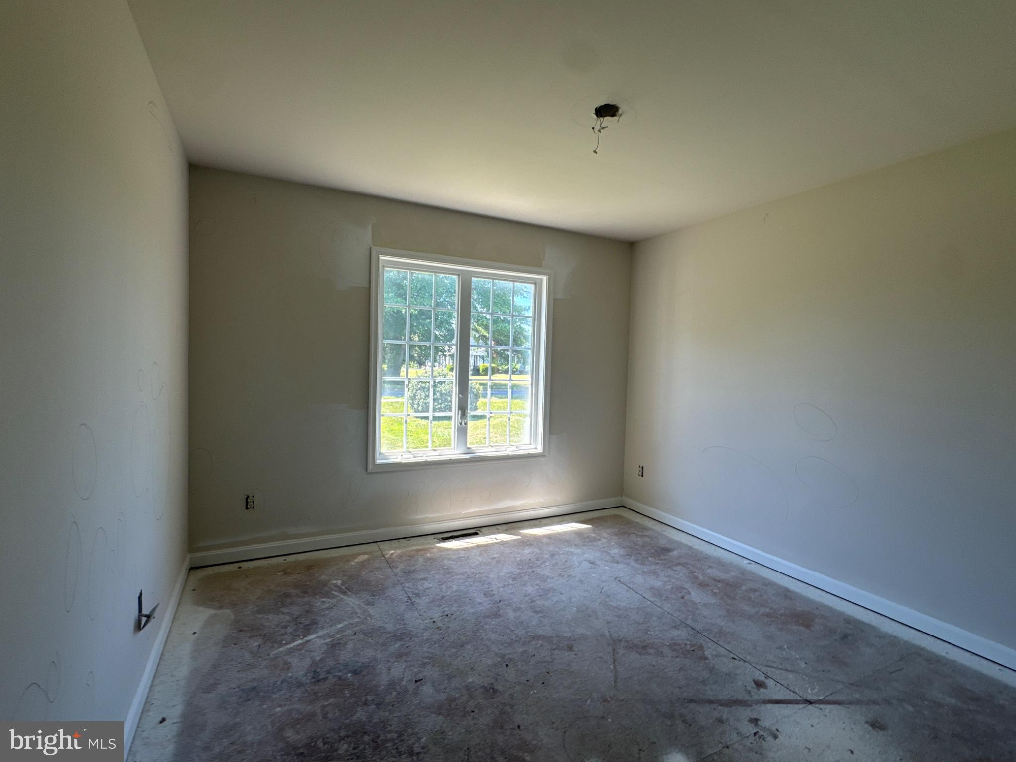 208 Oak Street Ellendale, DE 19941 - Photo 14 of 18 Bright, airy room ready for transformation.