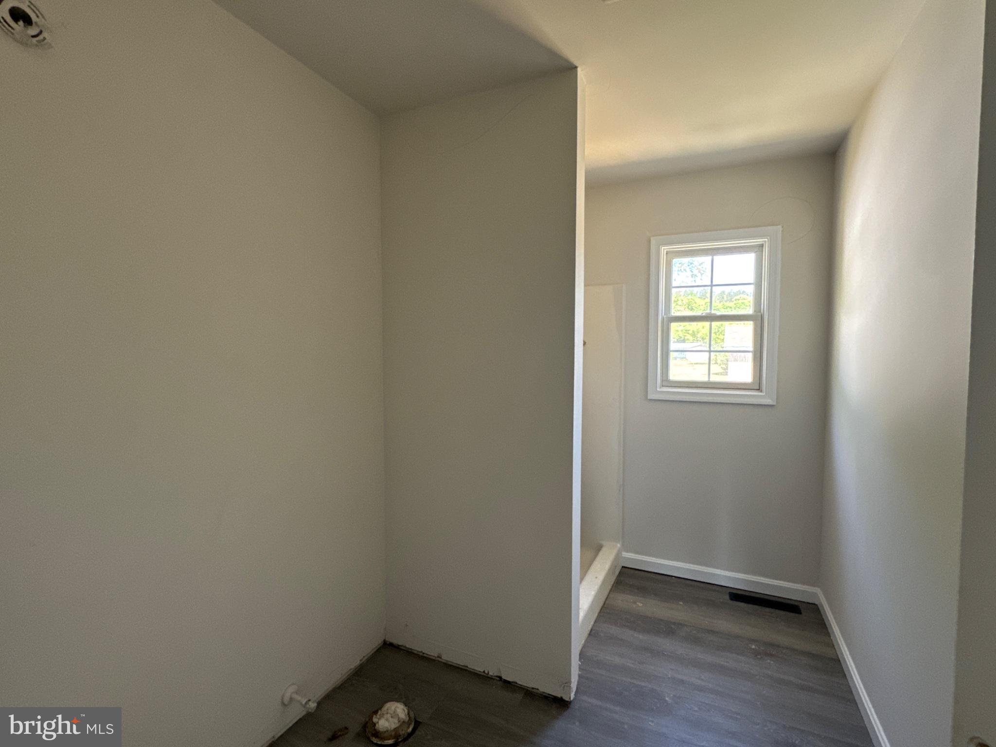 208 Oak Street Ellendale, DE 19941 - Photo 15 of 18 Bright, airy space awaiting transformation.