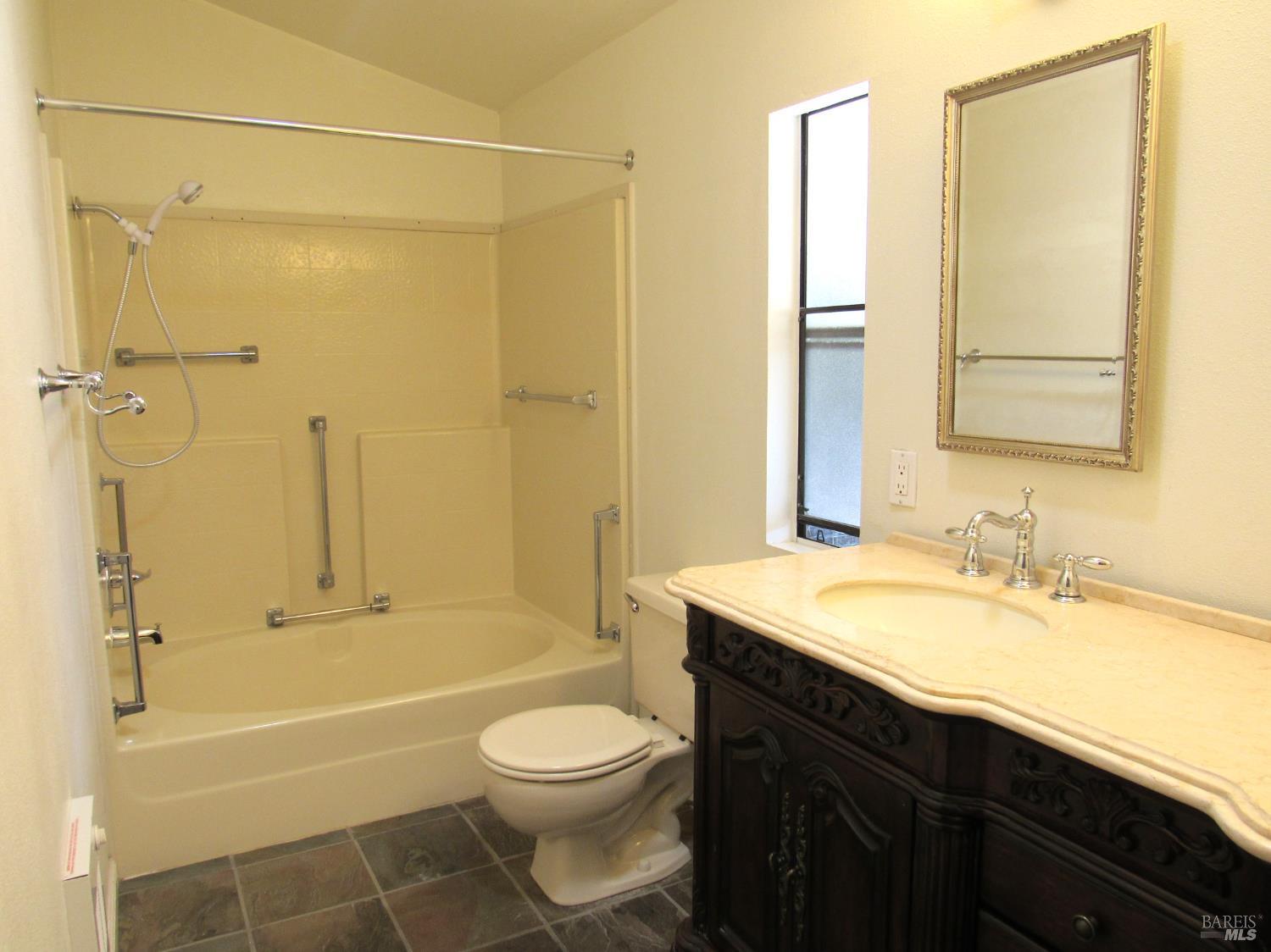 31 Ramon Street Sonoma, CA 95476 - Photo 19 of 24 a bathroom with a sink a toilet and shower