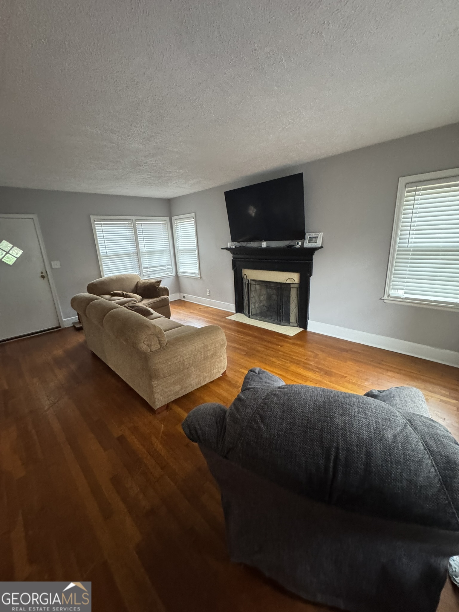 107 Springdale Drive Thomaston, GA 30286 - Photo 20 of 30 a bedroom with a bed and a television