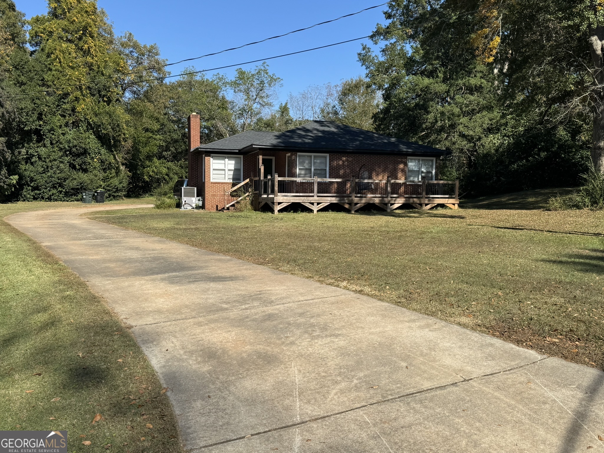 107 Springdale Drive Thomaston, GA 30286 - Photo 2 of 30 a view of house with outdoor space and swimming pool