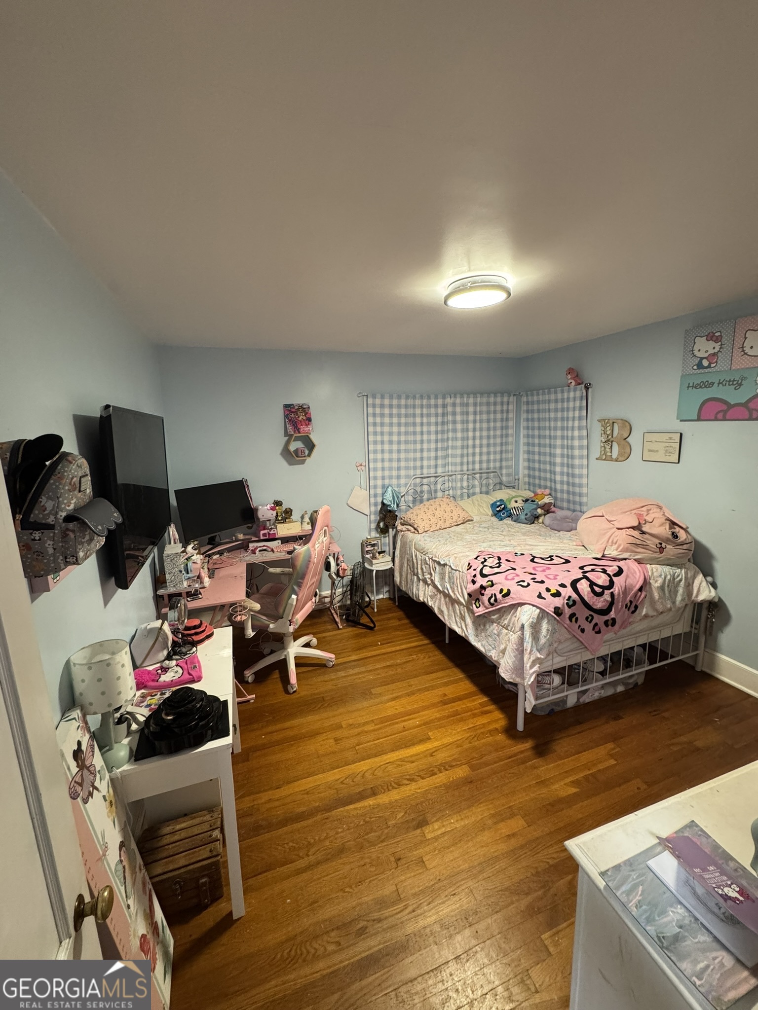 107 Springdale Drive Thomaston, GA 30286 - Photo 24 of 30 a bedroom with furniture and a wooden floor