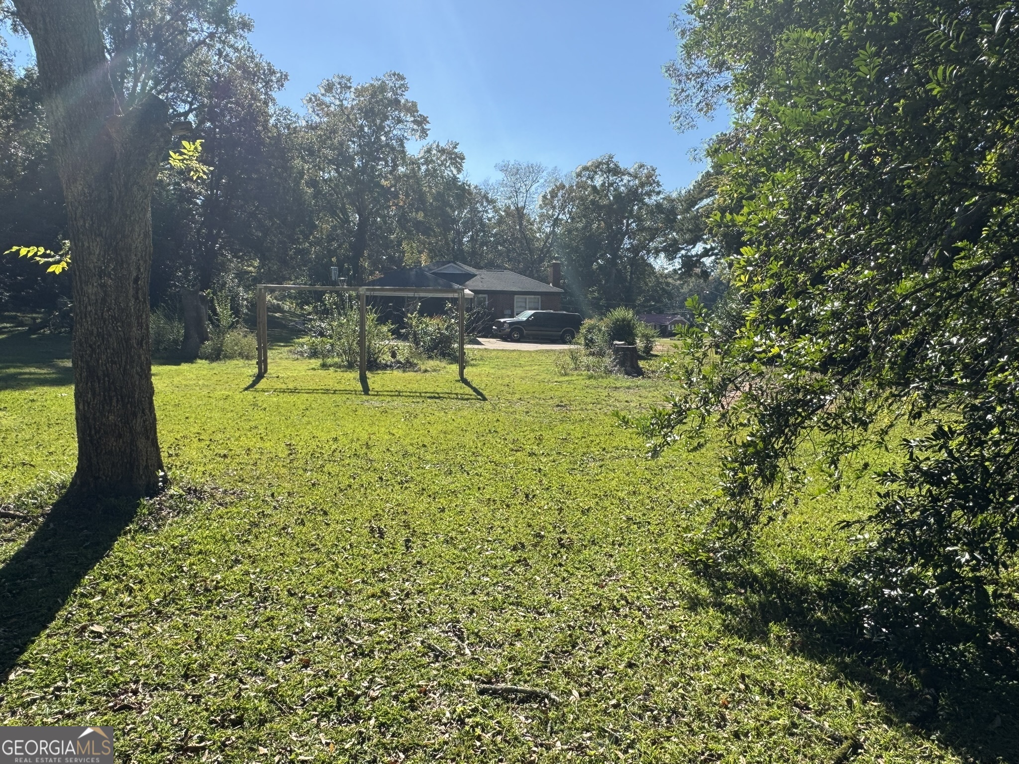 107 Springdale Drive Thomaston, GA 30286 - Photo 6 of 30 a view of swimming pool with a yard