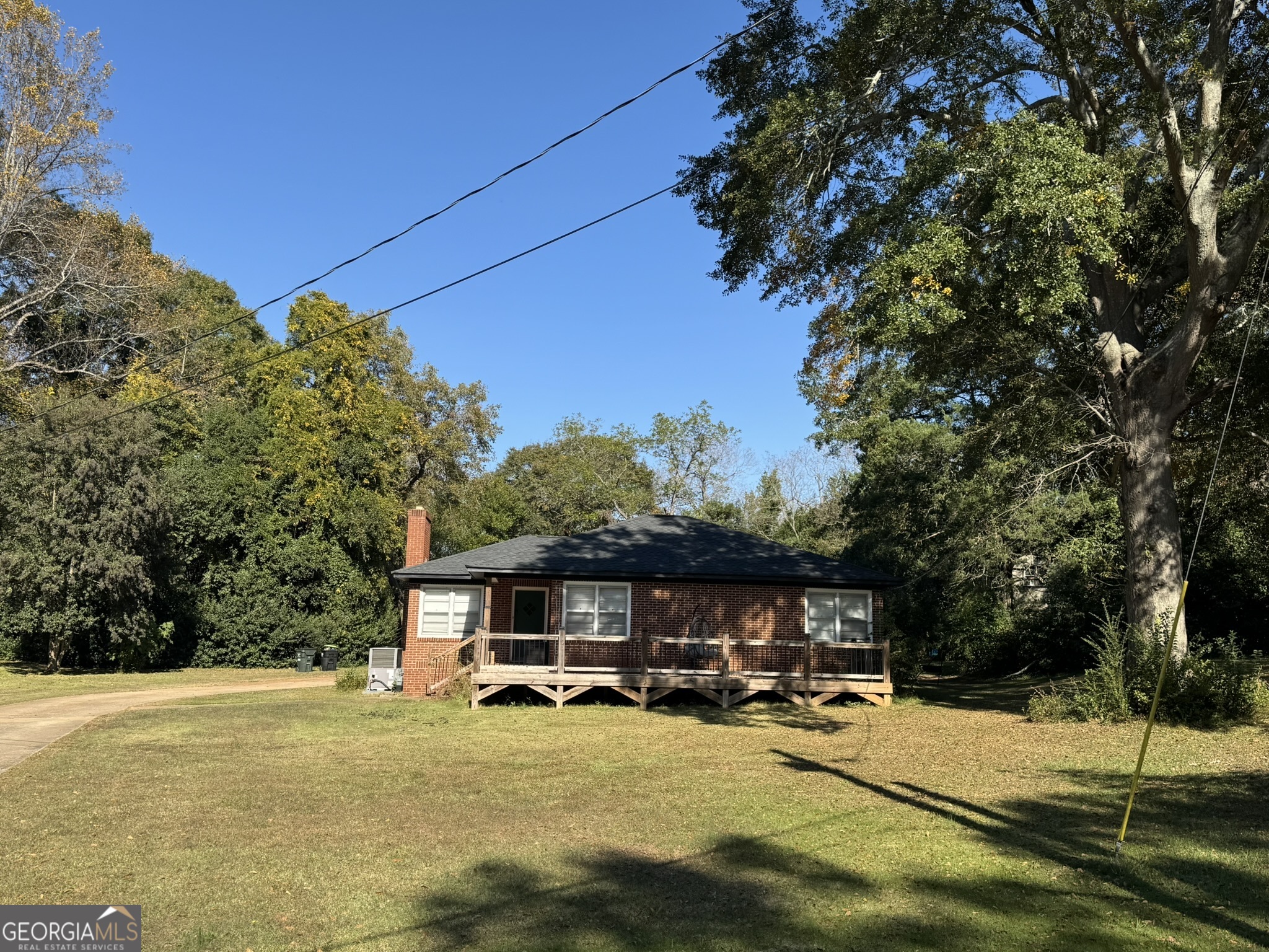 107 Springdale Drive Thomaston, GA 30286 - Photo 10 of 30 a view of a house with backyard space and sitting area