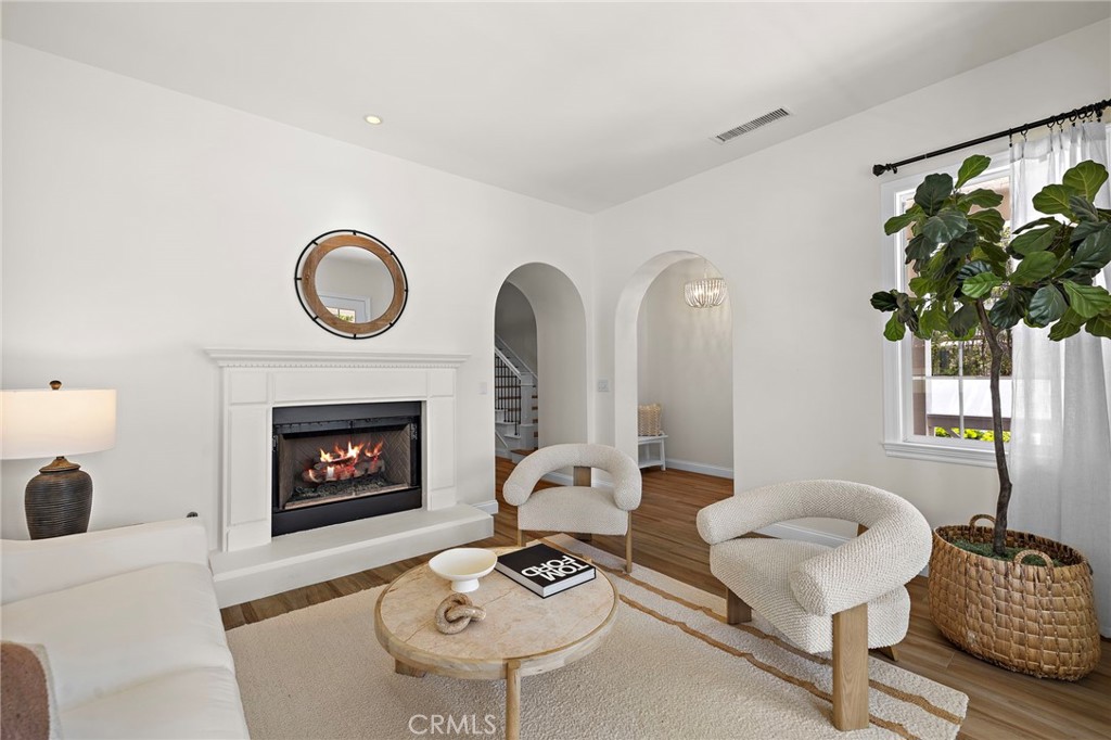 3 Tranquility Place Ladera Ranch, CA 92694 - Photo 8 of 63 a living room with furniture and a fireplace