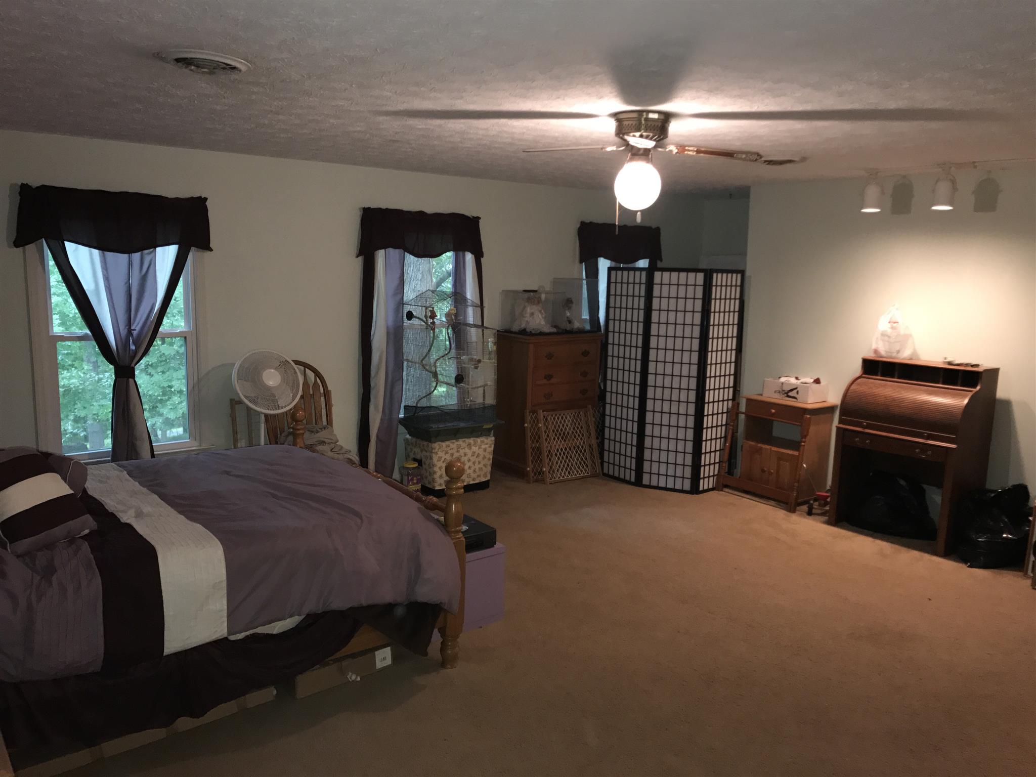 3710 Baggett Road Springfield, TN 37172 - Photo 4 of 16 a bed room with a bed and a television