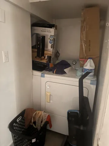 a bathroom with a sink toilet and mirror