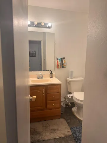 a bedroom with a bed with window