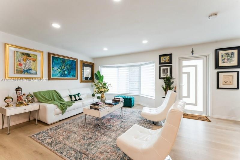 12555 Southwest 31st Street Miami, FL 33175 - Photo 11 of 47 a living room with furniture and wooden floor