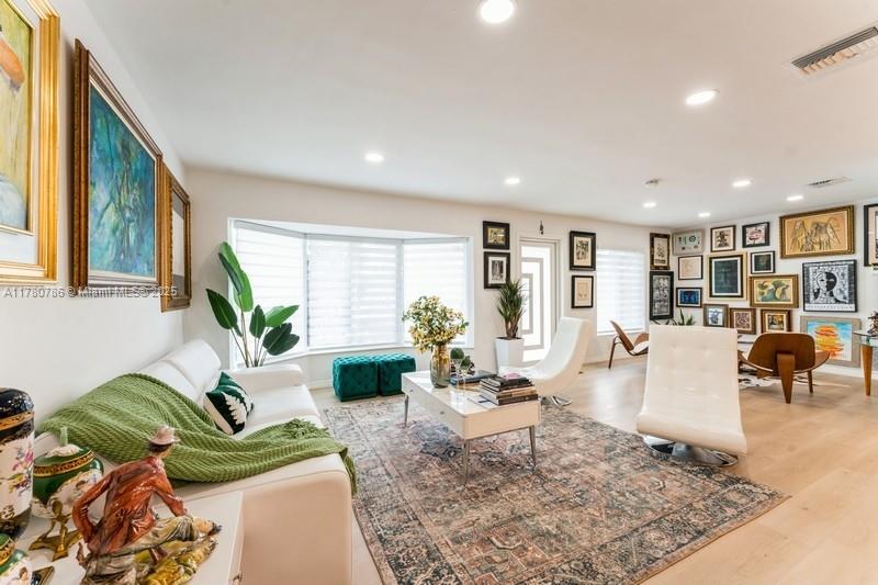 12555 Southwest 31st Street Miami, FL 33175 - Photo 21 of 47 a living room with furniture large window and a table