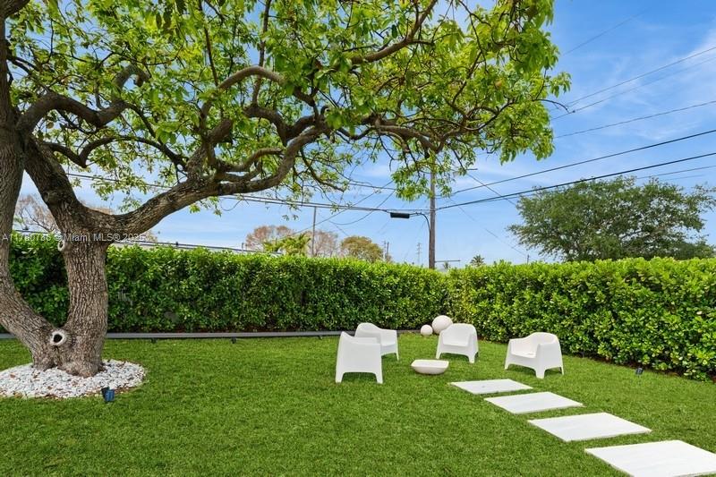 12555 Southwest 31st Street Miami, FL 33175 - Photo 36 of 47 a garden view with a seating space