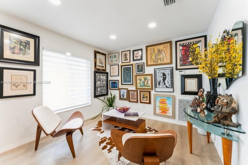 12555 Southwest 31st Street Miami, FL 33175 - Photo 7 of 47 a living room with furniture and a floor to ceiling window