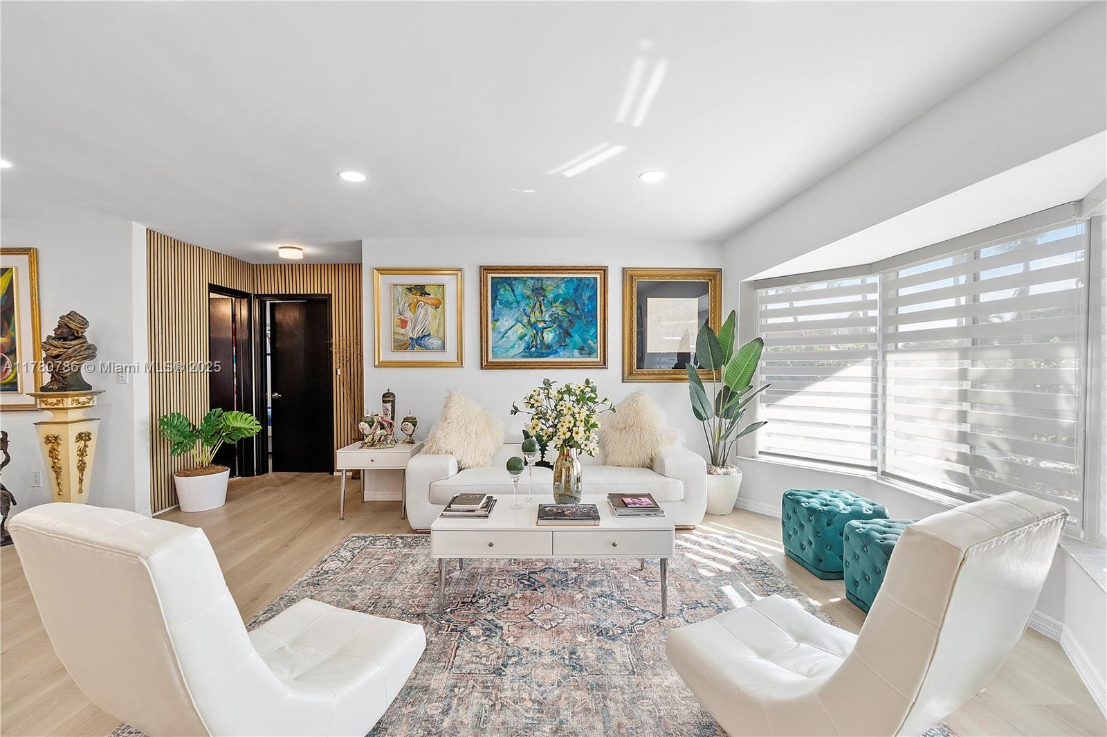 12555 Southwest 31st Street Miami, FL 33175 - Photo 8 of 47 a living room with furniture and a large window