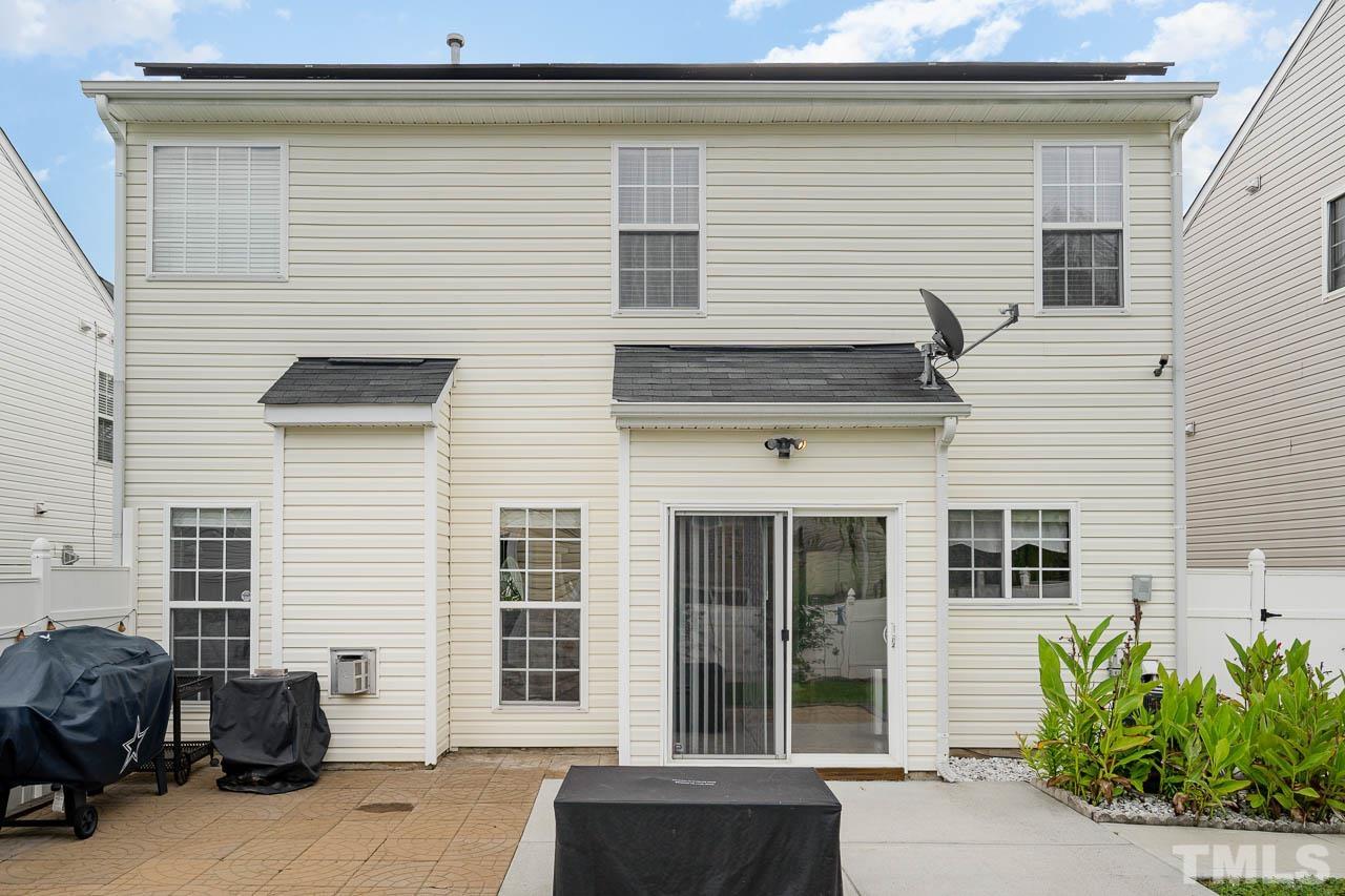 4445 Snowcrest Lane Raleigh, NC 27616 - Photo 27 of 29 a view of a house with a patio