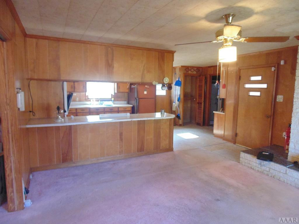 413 Eugene Freeman Road Colerain, NC 27924 - Photo 5 of 26 DINING ROOM INTO KITCHEN