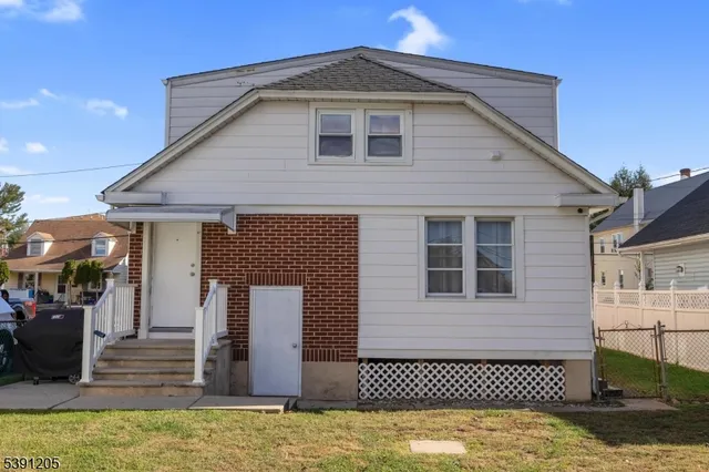 a front view of a house with glass windows
