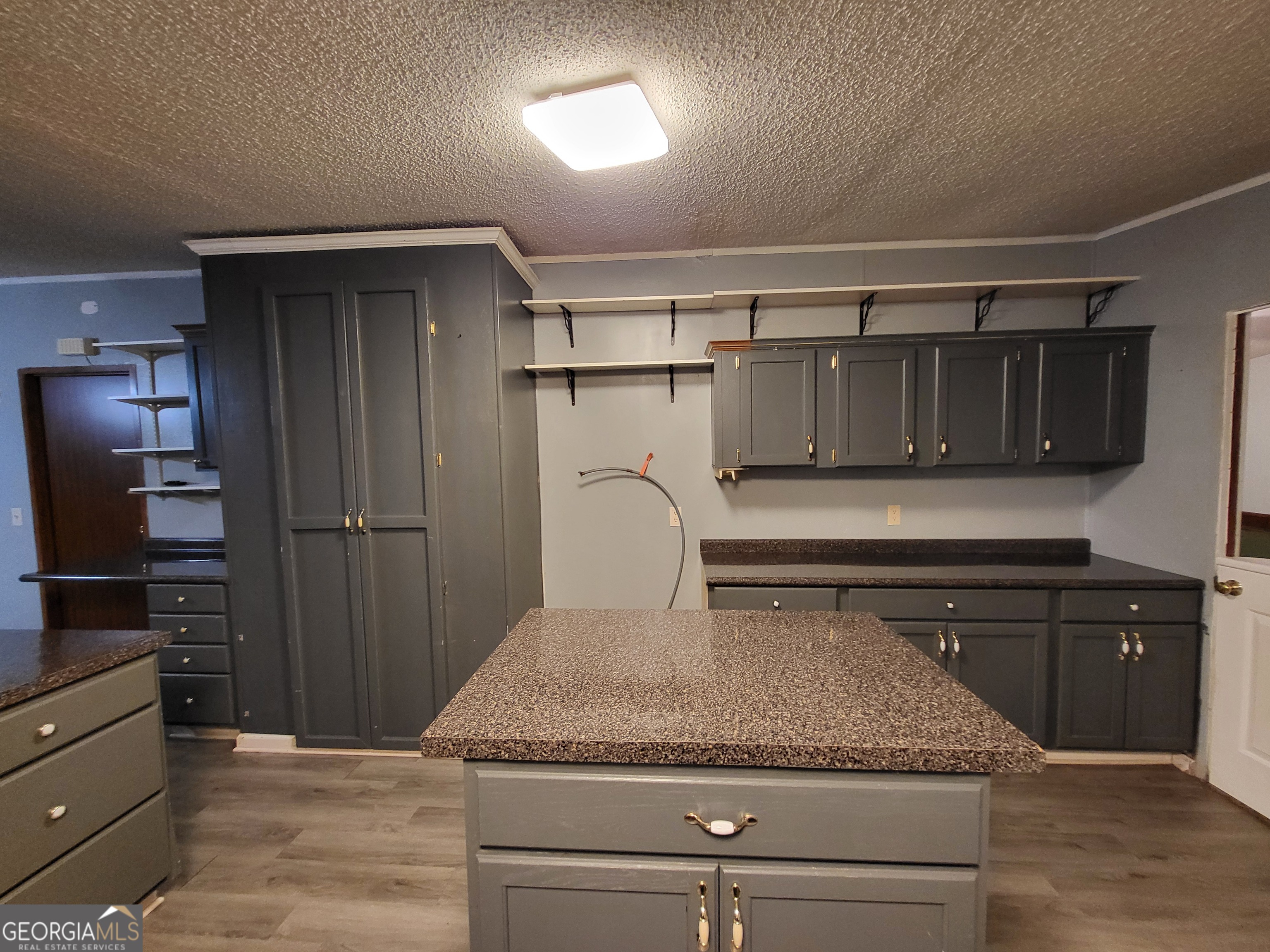 8449 Lee Road Salem, AL 36874 - Photo 12 of 26 a bathroom with a sink and a mirror