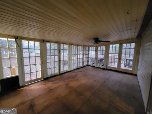 an empty room with windows