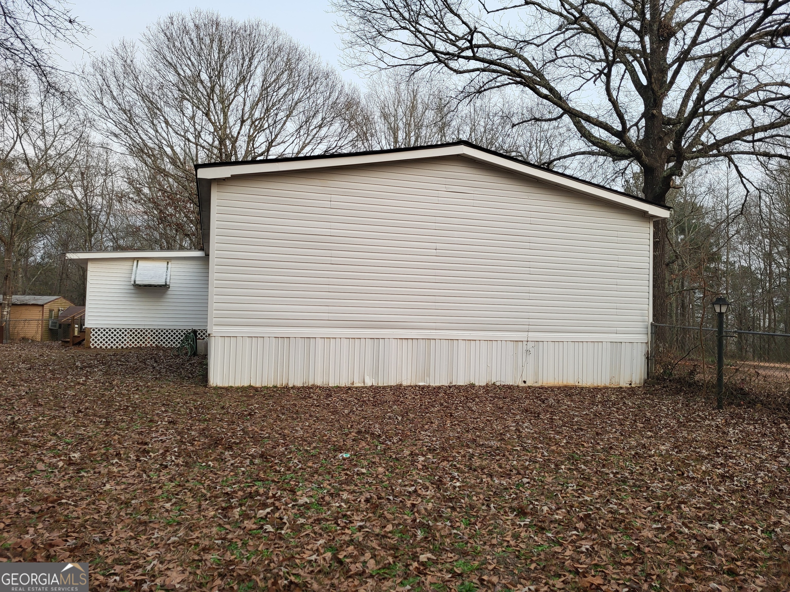 8449 Lee Road Salem, AL 36874 - Photo 5 of 26 a backyard of a house