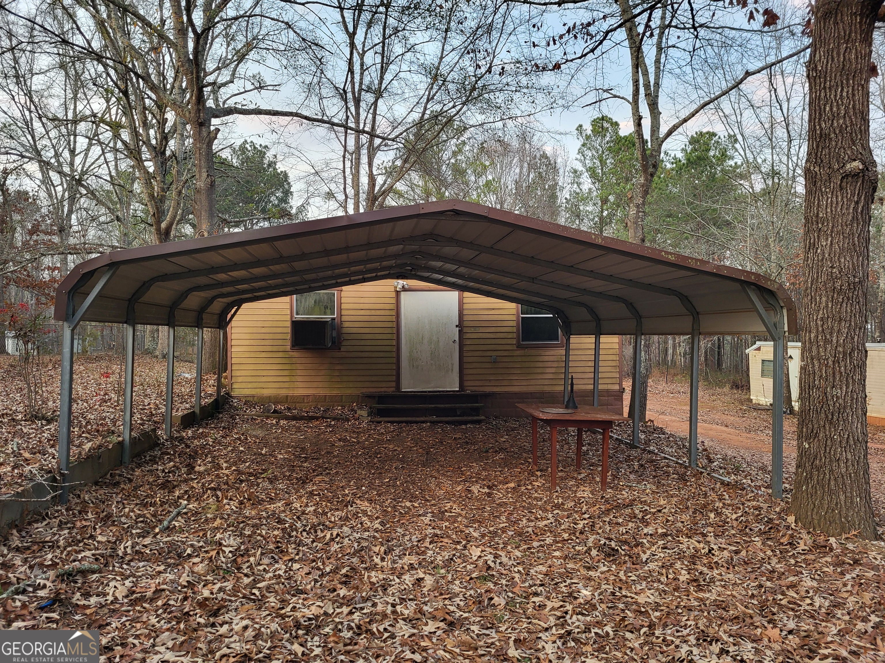 8449 Lee Road Salem, AL 36874 - Photo 6 of 26 a front view of a house with garden