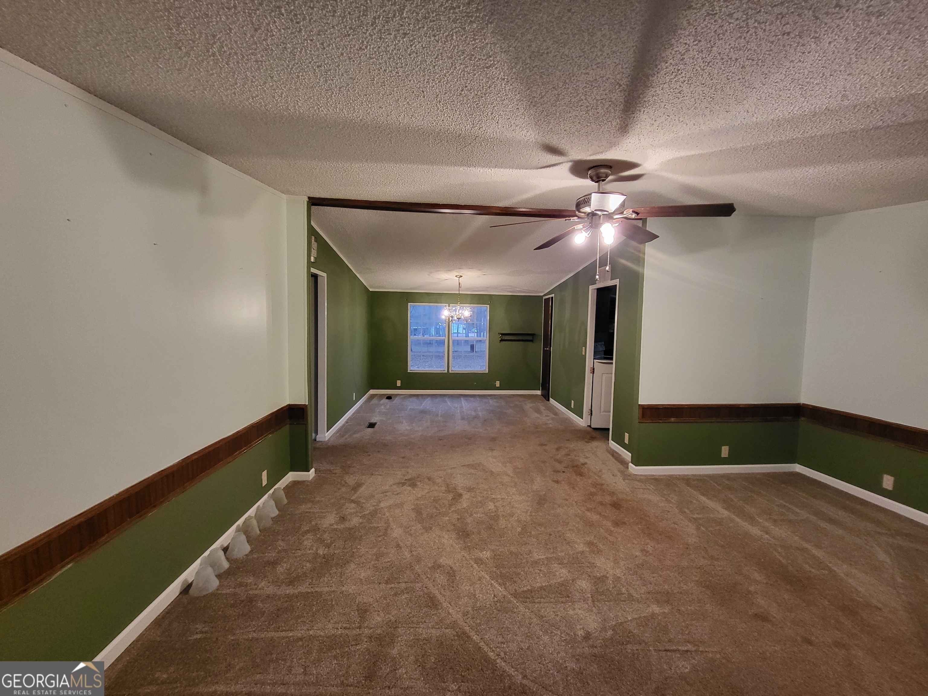 8449 Lee Road Salem, AL 36874 - Photo 7 of 26 a view of a livingroom with a ceiling fan and window
