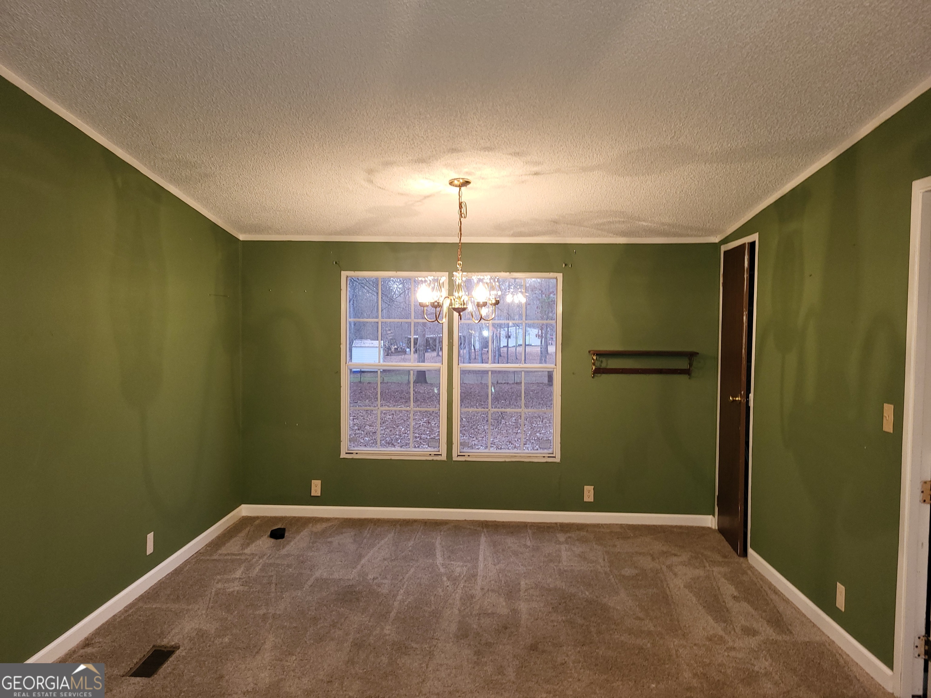 8449 Lee Road Salem, AL 36874 - Photo 8 of 26 a view of an empty room with a window