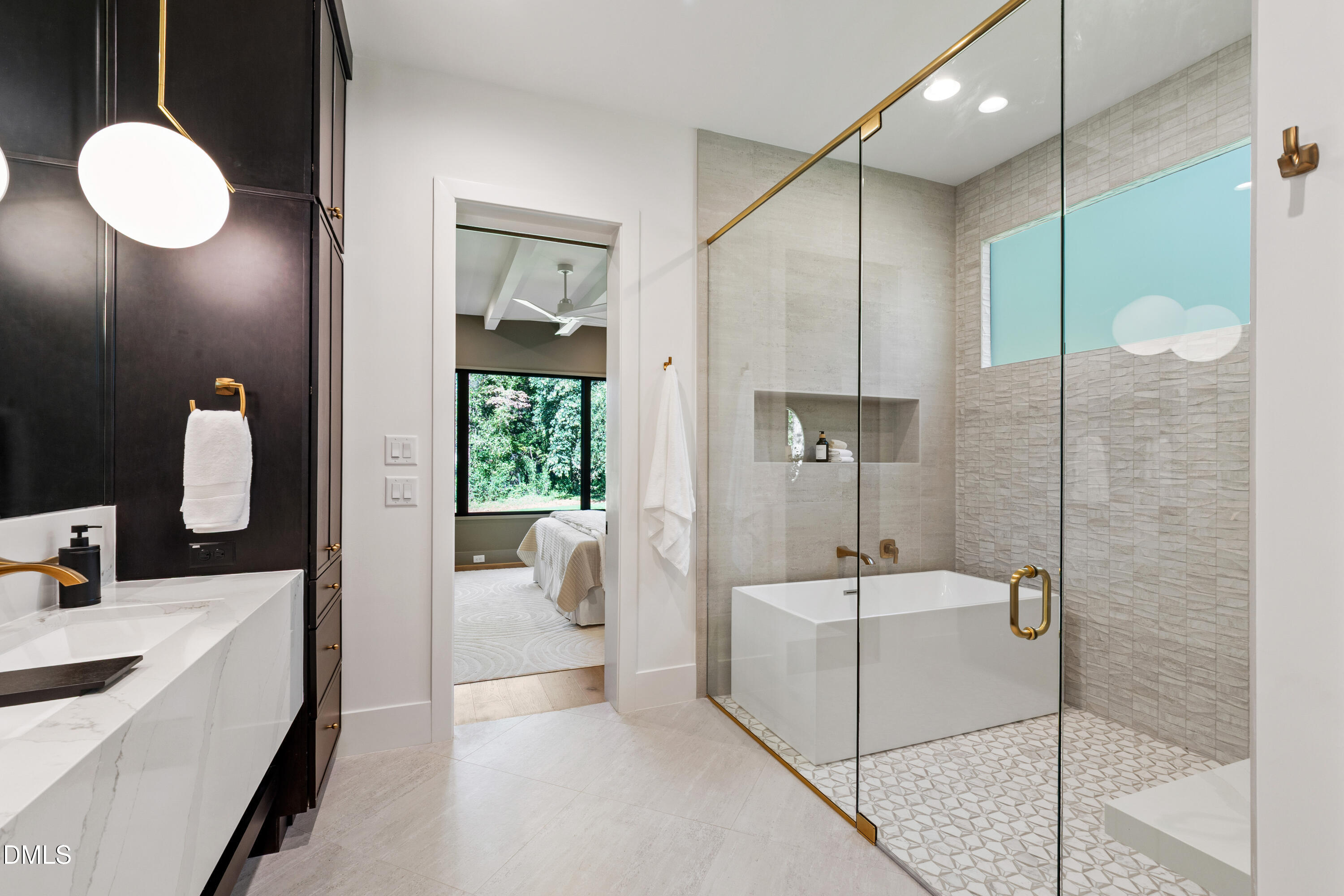 7809 Haymarket Lane Raleigh, NC 27615 - Photo 21 of 62 a bathroom with a sink a toilet and shower