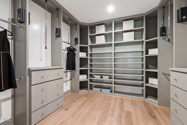 a view of an empty walk in closet