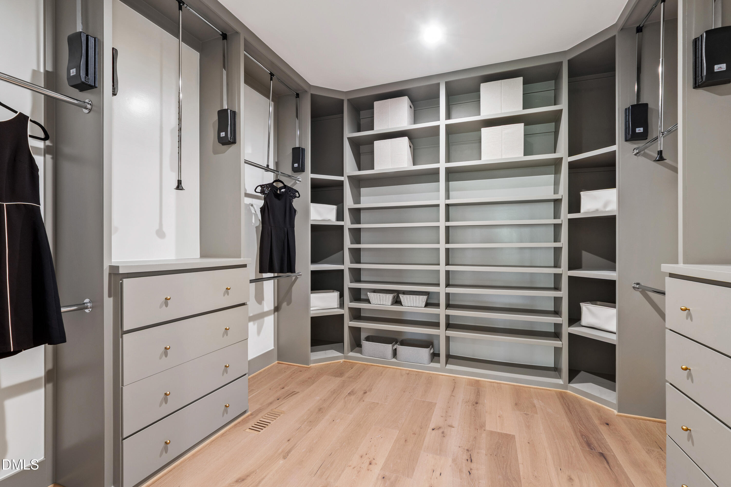 7809 Haymarket Lane Raleigh, NC 27615 - Photo 23 of 62 a view of walk in closet and bedroom view