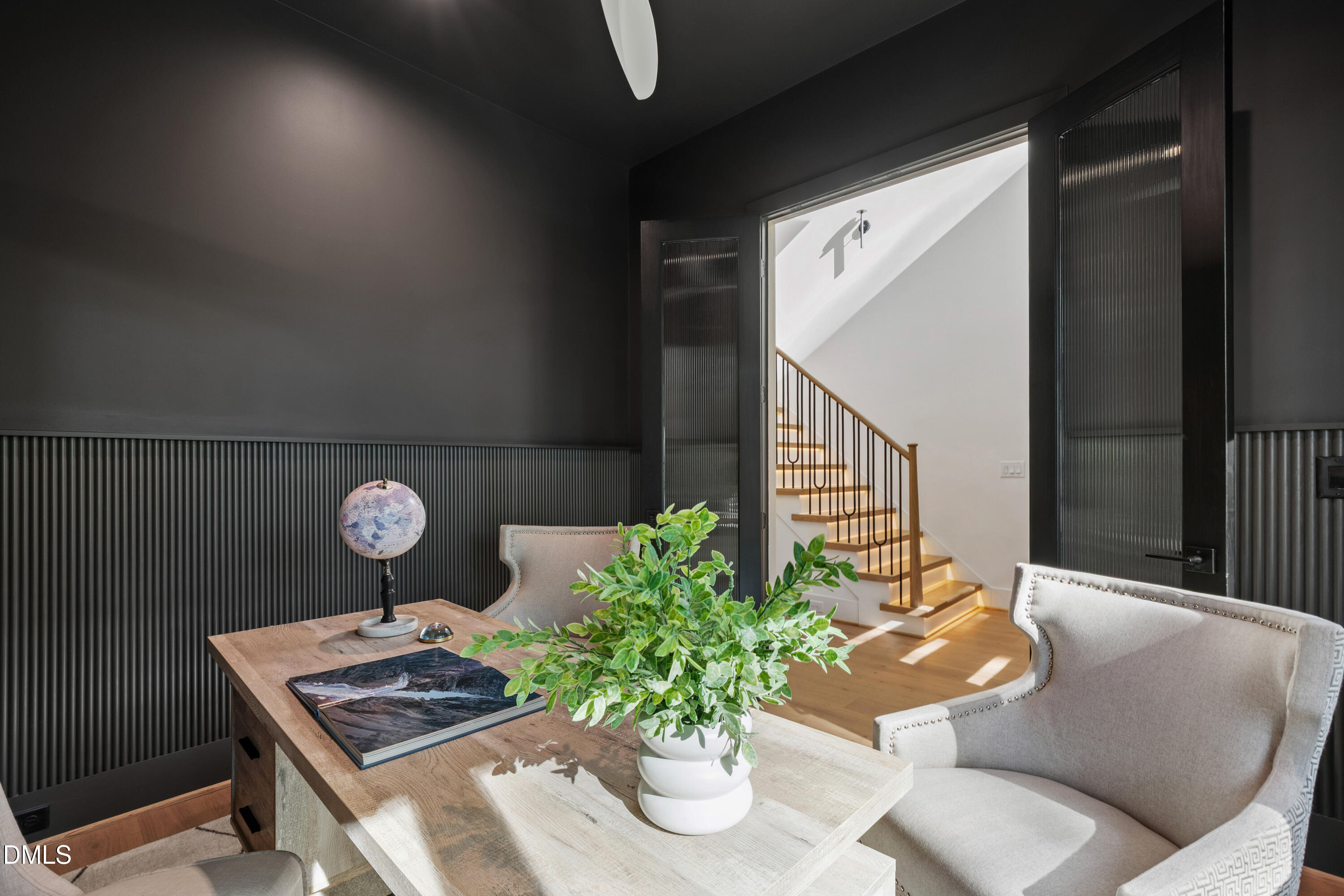 7809 Haymarket Lane Raleigh, NC 27615 - Photo 26 of 62 a living room with furniture and a potted plant