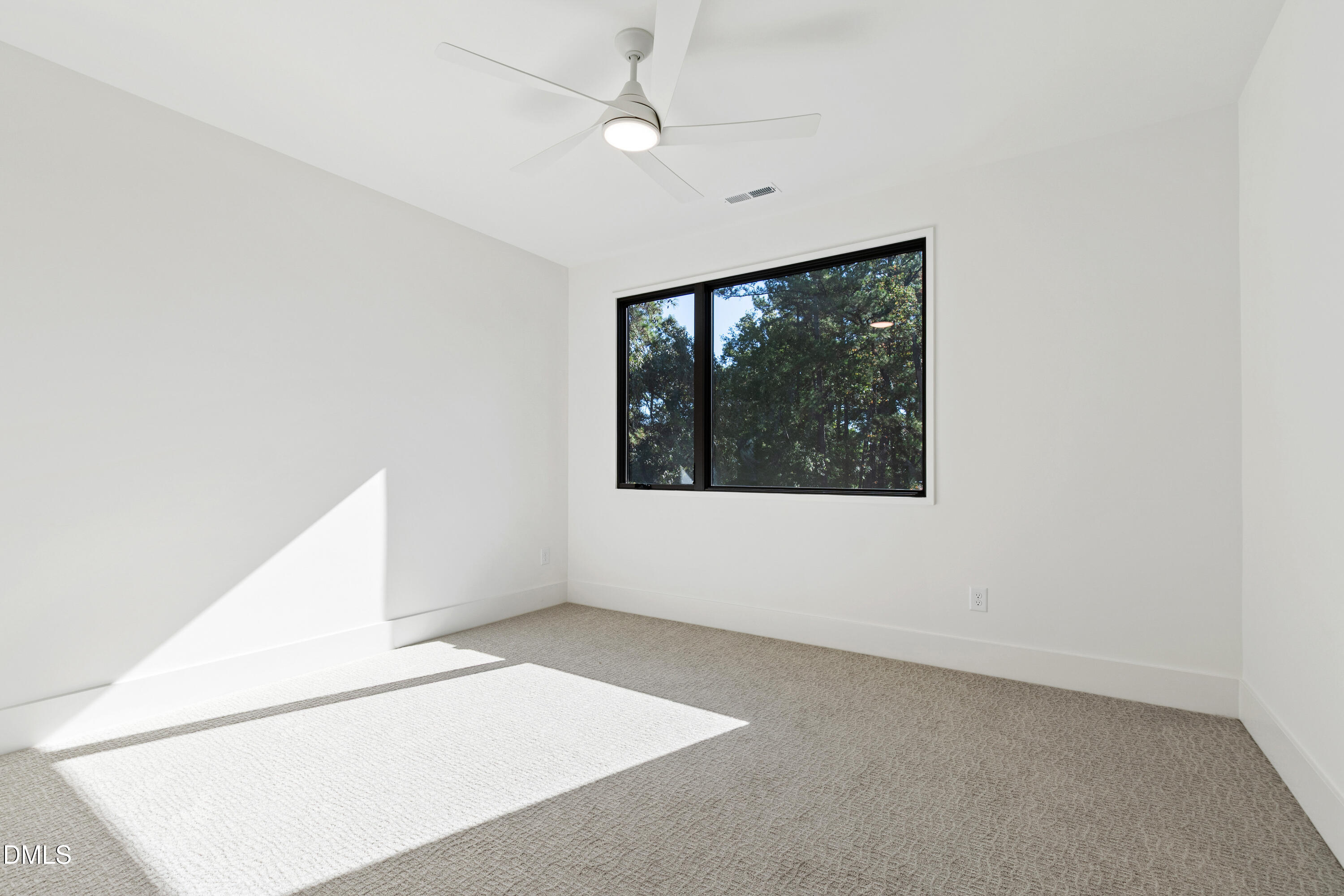 7809 Haymarket Lane Raleigh, NC 27615 - Photo 41 of 62 an empty room with a window