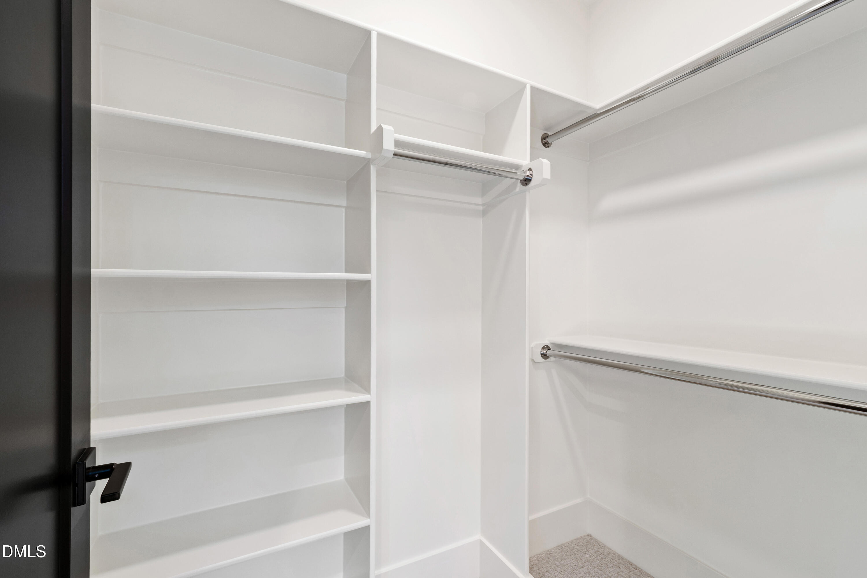 7809 Haymarket Lane Raleigh, NC 27615 - Photo 52 of 62 a view of an empty walk in closet