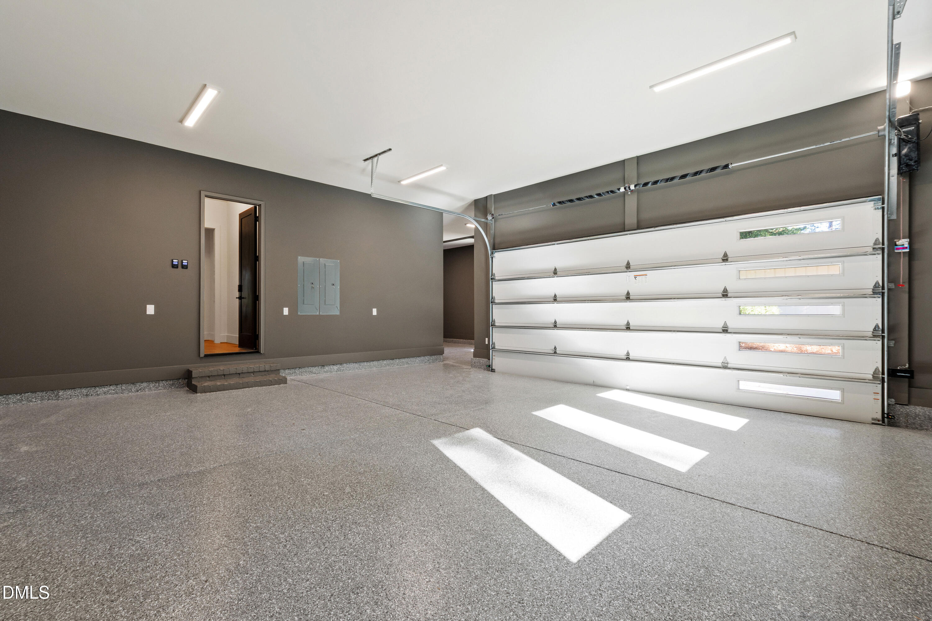 7809 Haymarket Lane Raleigh, NC 27615 - Photo 55 of 62 a view of a room with a cabinet and mirrors