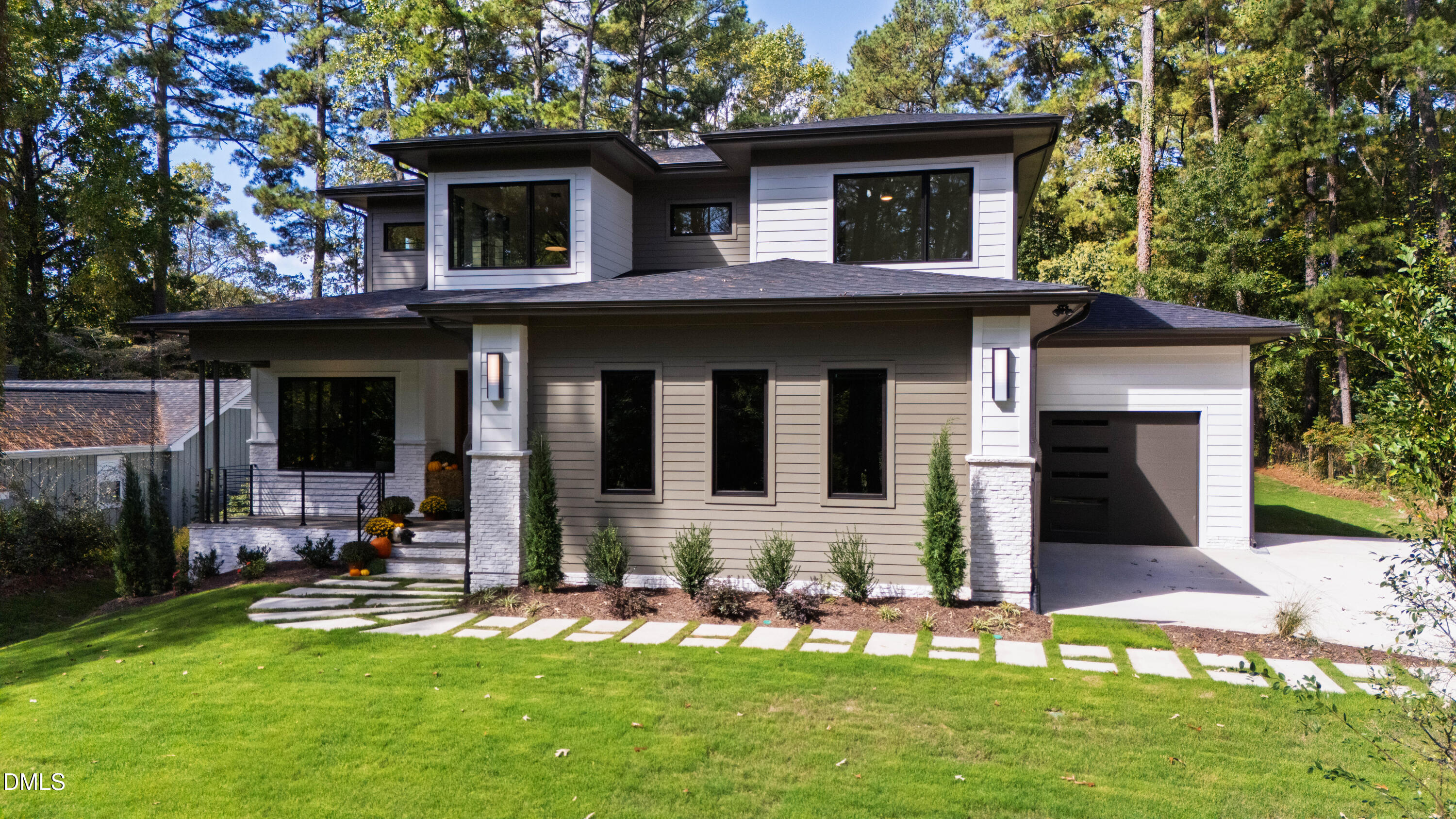 7809 Haymarket Lane Raleigh, NC 27615 - Photo 60 of 62 a view of a house with a yard and furniture