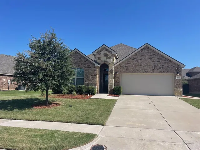 a front view of house with yard