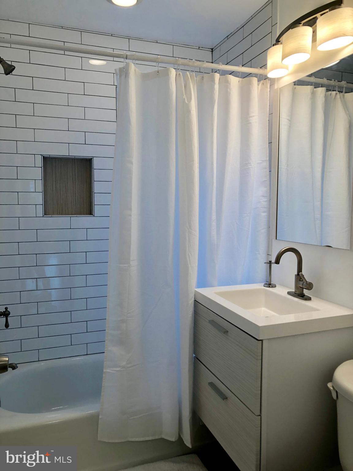 22 East Reed Avenue Alexandria, VA 22305 - Photo 7 of 13 Updated Bathroom