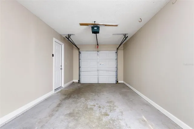 a view of backyard of house with yard