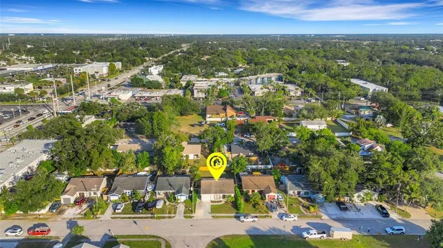 an aerial view of residential houses with outdoor space