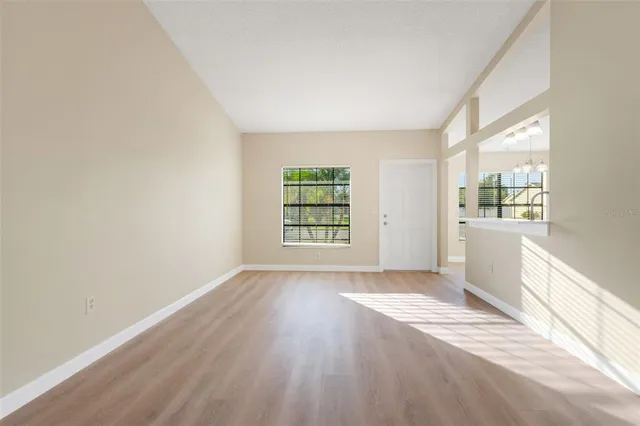 an empty room with windows