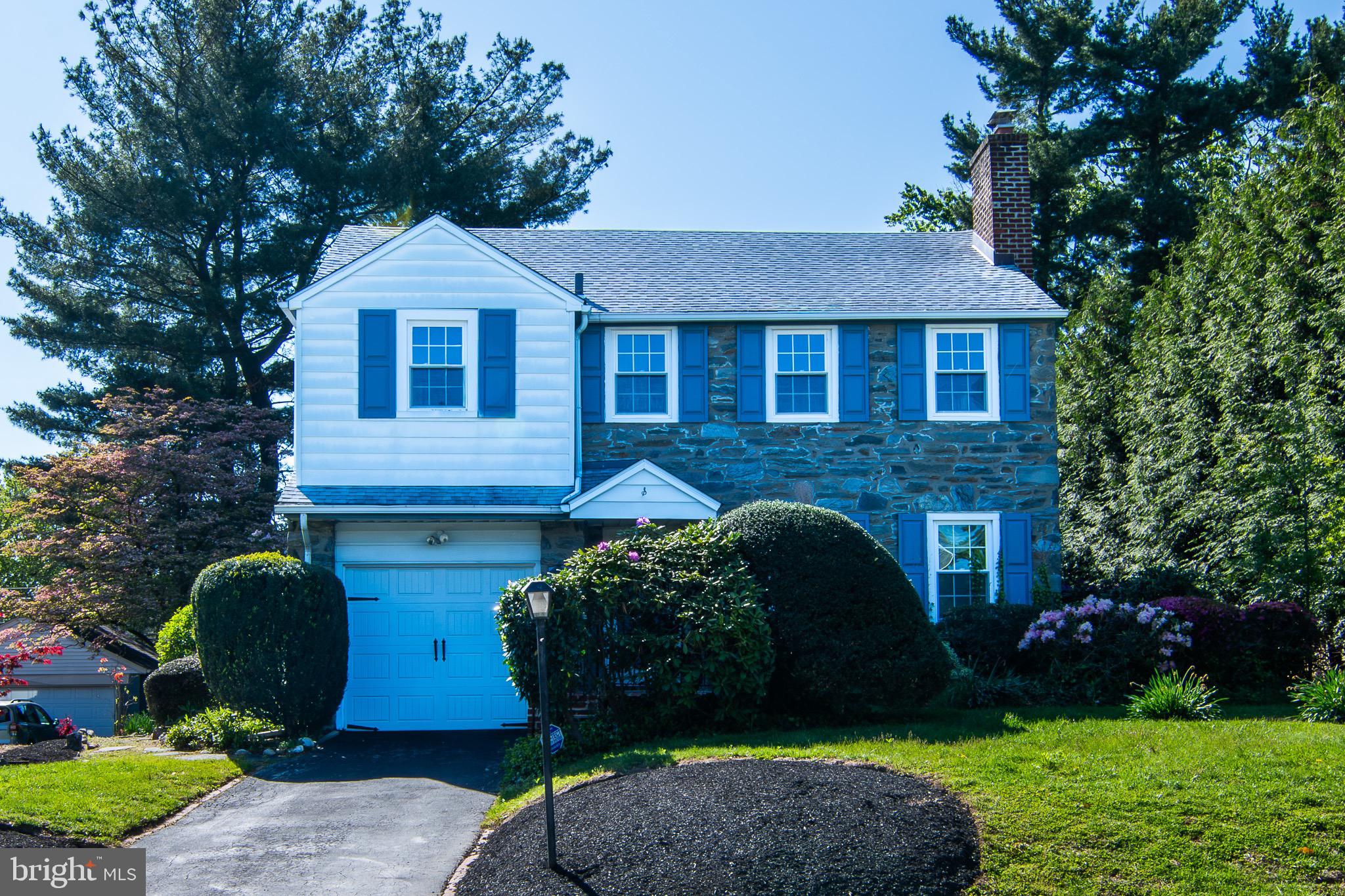 5004 Fairway Road Drexel Hill, PA 19026 - Photo 2 of 29 a front view of a house with a yard and garage