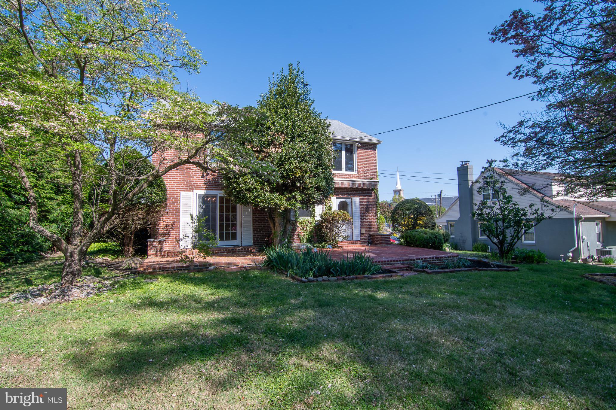 5004 Fairway Road Drexel Hill, PA 19026 - Photo 21 of 29 a view of a house with a yard and tree s