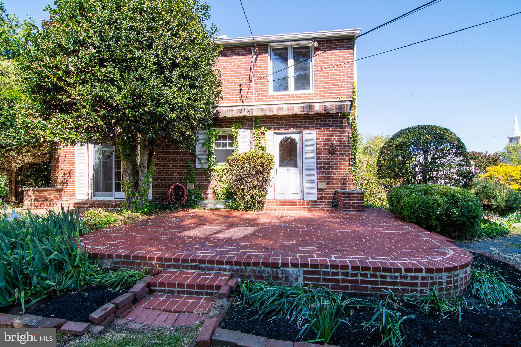 5004 Fairway Road Drexel Hill, PA 19026 - Photo 6 of 29 a view of a yard with plants and large tree
