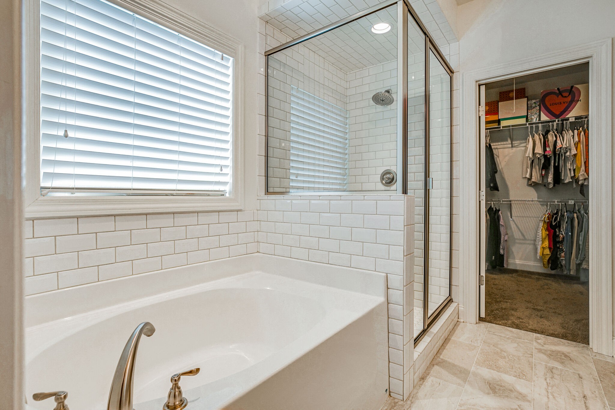 911 Contessa Drive Murfreesboro, TN 37128 - Photo 27 of 42 a bathroom with a tub and a shower